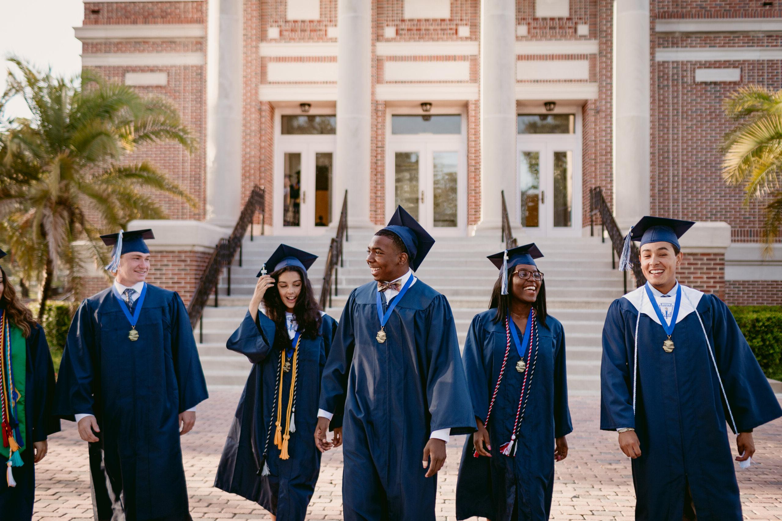 Photo of Foundation Academy graduates outside of the Plant Street Campus